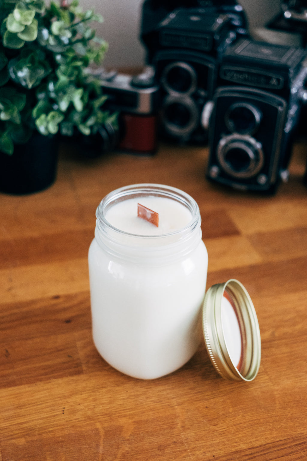 Wood wick candles are unique, with their soothing crackling sound, superior fragrance throw, cleaner and more even burn, and eco-friendly. They are a natural aesthetic, providing a multi-sensory experience that many find  luxurious and relaxing than traditional cotton wicks. 
Woodwick candles create a wider flame, leading to a fuller melt pool and better scent dispersal. They tend to be a slower burning candle and longer lasting.